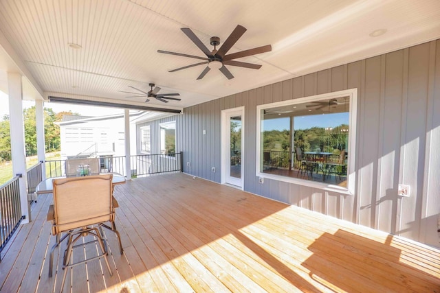 wooden deck with ceiling fan