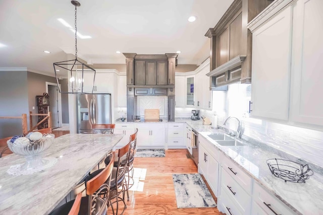 kitchen featuring white cabinets, a sink, glass insert cabinets, and stainless steel fridge with ice dispenser