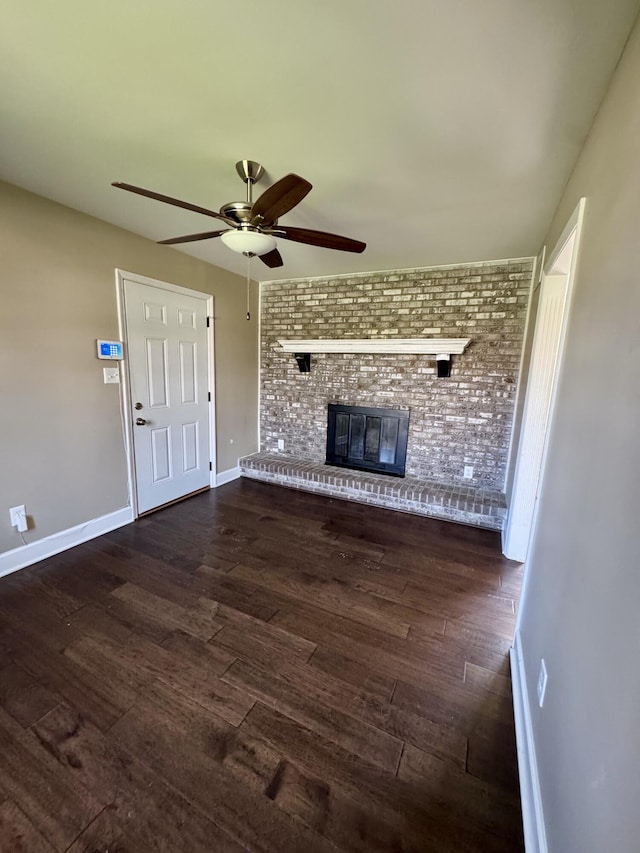 unfurnished living room with wood finished floors, ceiling fan, and baseboards