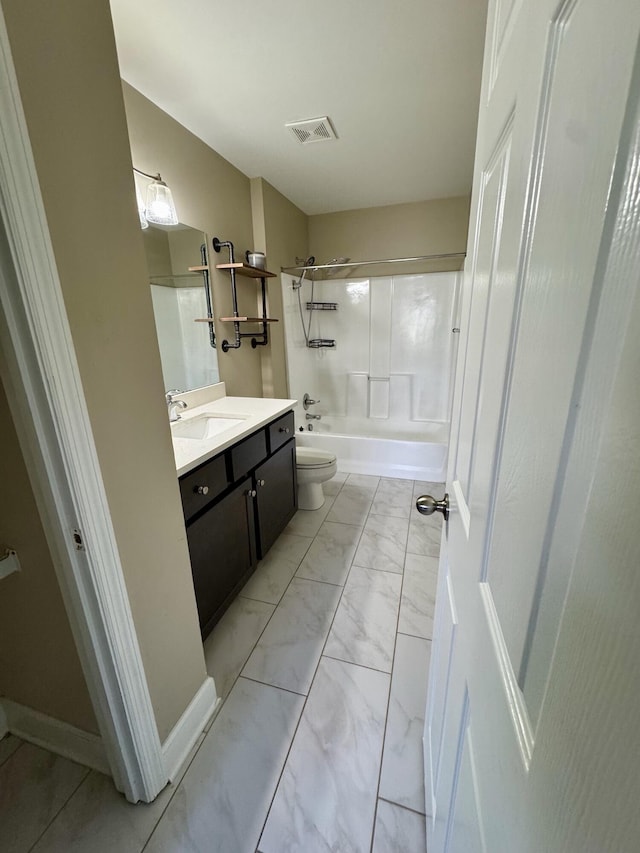 bathroom featuring vanity, shower / bath combination, toilet, visible vents, and marble finish floor