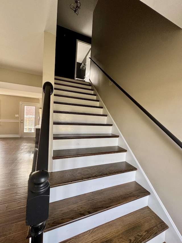 staircase with baseboards