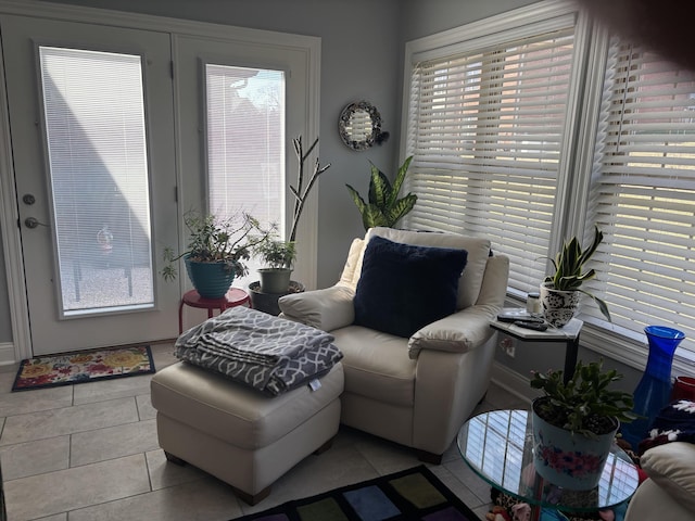 living area with light tile patterned floors