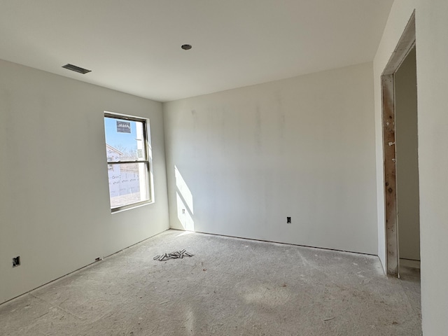 spare room featuring visible vents