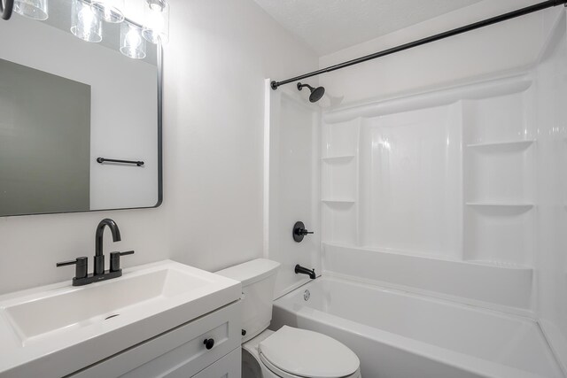 full bathroom with washtub / shower combination, vanity, and toilet