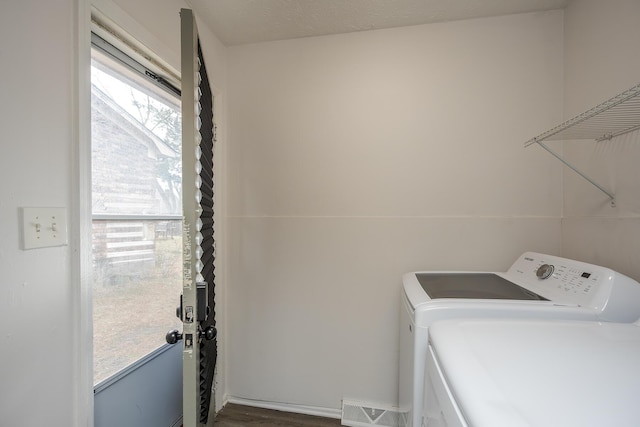 laundry room featuring laundry area, independent washer and dryer, and visible vents