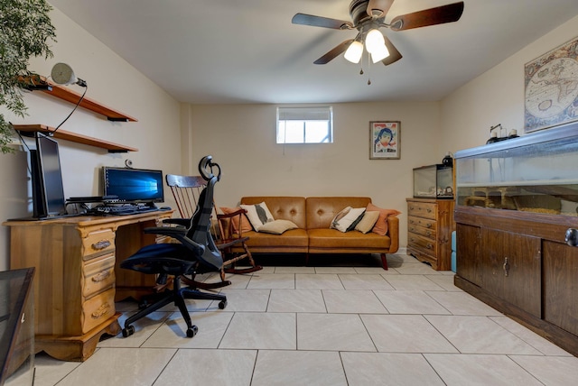 office area featuring light tile patterned floors and a ceiling fan