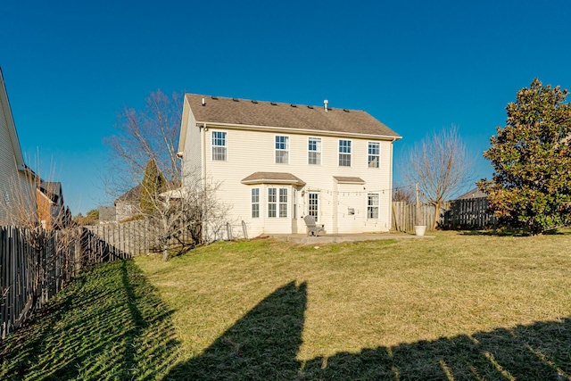 rear view of property featuring a patio area, a fenced backyard, and a lawn