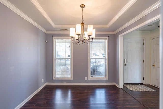 interior space featuring crown molding, a notable chandelier, dark wood finished floors, and baseboards