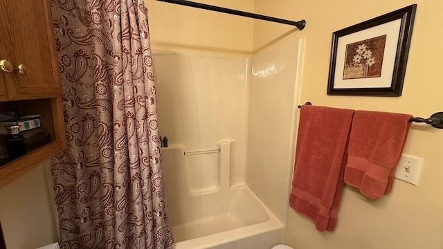 full bath featuring shower / tub combo