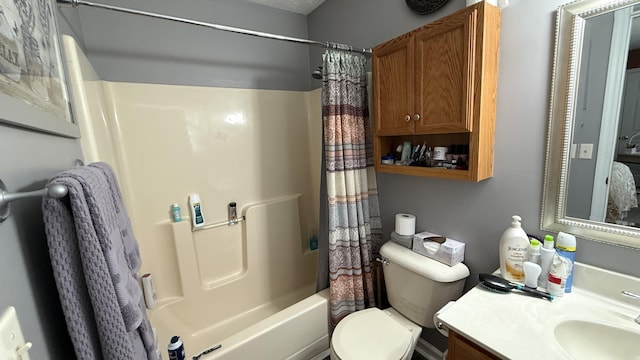 bathroom featuring shower / bath combo, vanity, and toilet