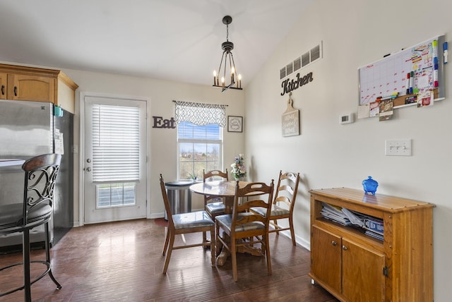 136 Country Ln, Lancaster, KY 40444 - dining space with a chandelier, dark wood finished floors, baseboards, and vaulted ceiling