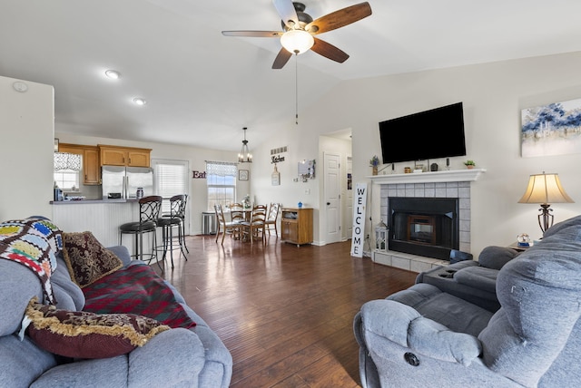 136 Country Ln, Lancaster, KY 40444 - living room with a ceiling fan, lofted ceiling, dark wood-style flooring, and a tiled fireplace
