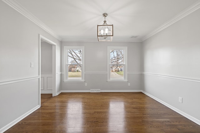 unfurnished dining area featuring an inviting chandelier, crown molding, wood finished floors, and visible vents