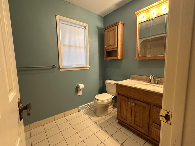 utility room featuring electric water heater