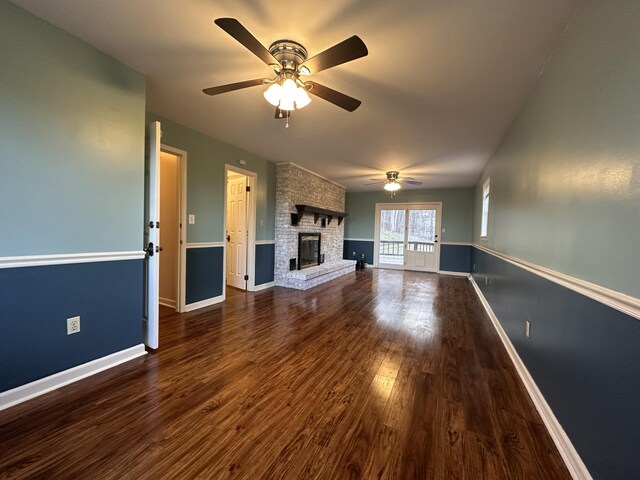 hall with dark wood finished floors and baseboards