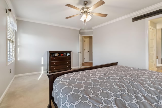 bedroom featuring ornamental molding, a barn door, carpet flooring, and baseboards