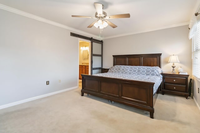 bedroom with crown molding, a barn door, light colored carpet, and baseboards