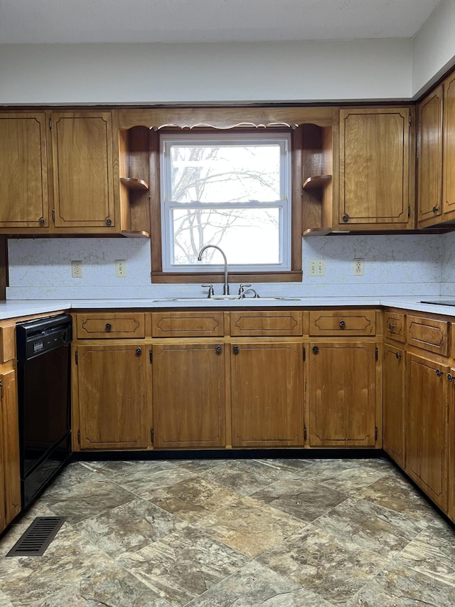 kitchen with visible vents, dishwasher, light countertops, open shelves, and a sink