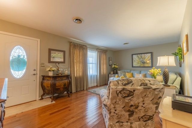 foyer entrance with light wood-style flooring