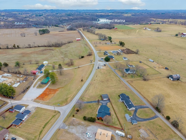 birds eye view of property featuring a rural view