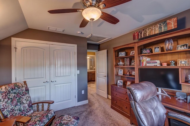 office area with carpet floors, ceiling fan, visible vents, and lofted ceiling