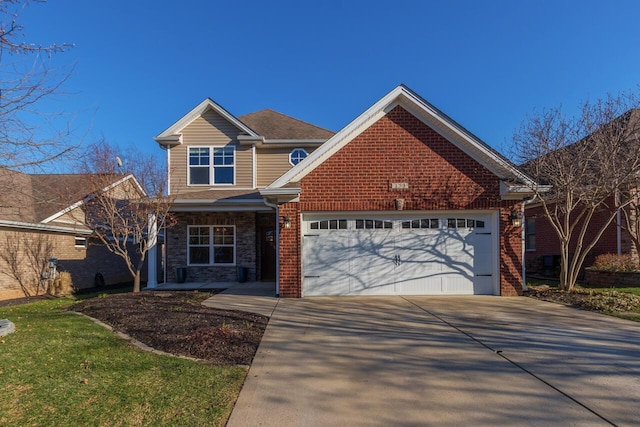 view of front of home with stone siding, brick siding, driveway, and an attached garage