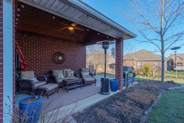 view of patio with an outdoor hangout area and a ceiling fan