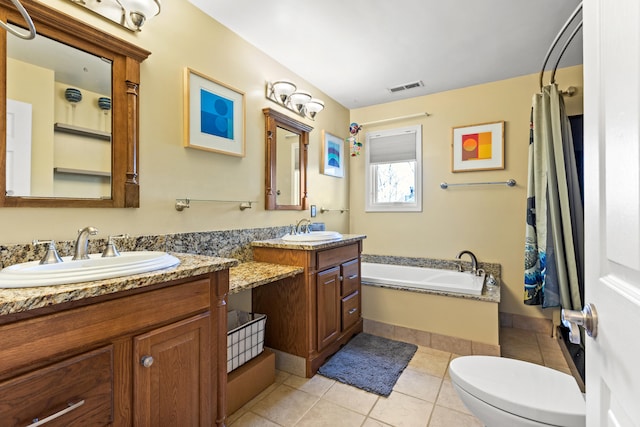 full bath featuring tile patterned flooring, toilet, a garden tub, vanity, and visible vents