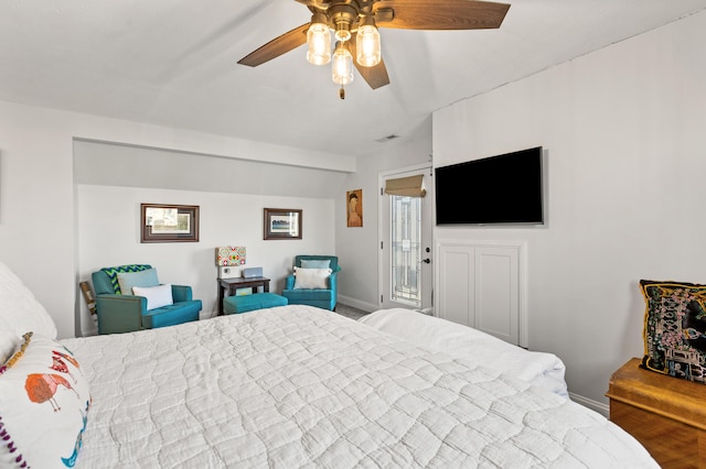 bedroom with lofted ceiling, ceiling fan, baseboards, and access to outside