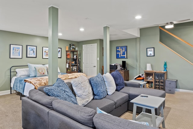 living area featuring light carpet, baseboards, and recessed lighting