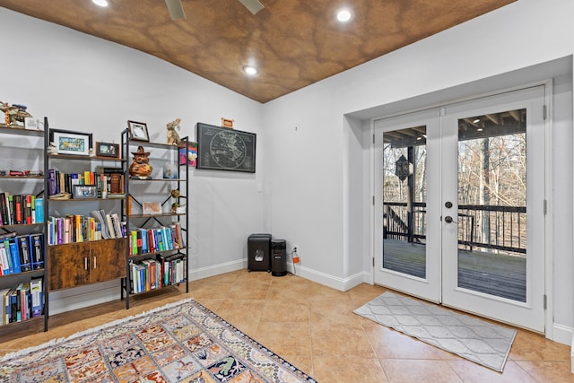 entryway featuring light tile patterned floors, recessed lighting, baseboards, and french doors