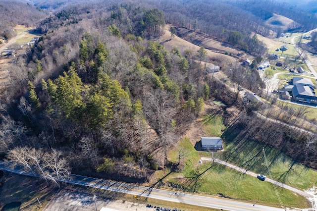 aerial view featuring a forest view