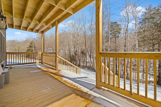 view of snow covered deck