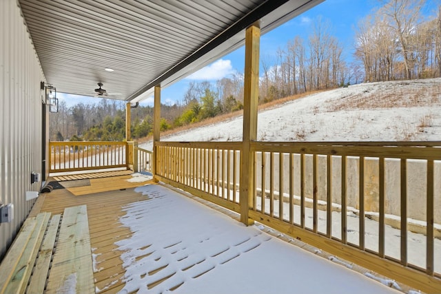 view of snow covered deck