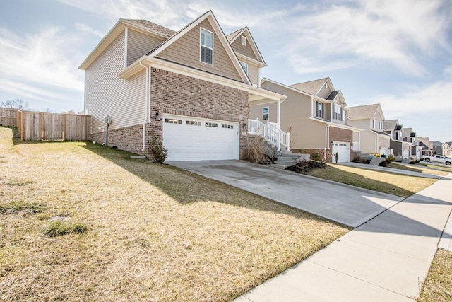 view of front facade featuring brick siding, concrete driveway, an attached garage, fence, and a residential view