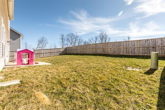 view of yard featuring a fenced backyard