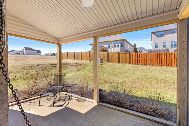 view of patio / terrace featuring fence