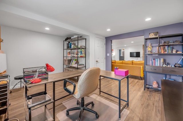 office area featuring light wood finished floors and recessed lighting