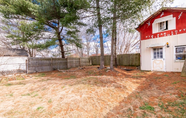 view of yard with a fenced backyard