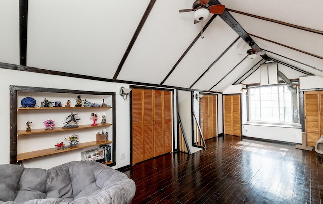 additional living space with lofted ceiling, hardwood / wood-style floors, and a ceiling fan