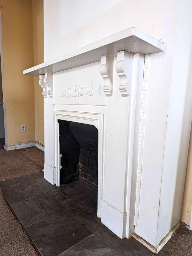 interior details featuring a fireplace