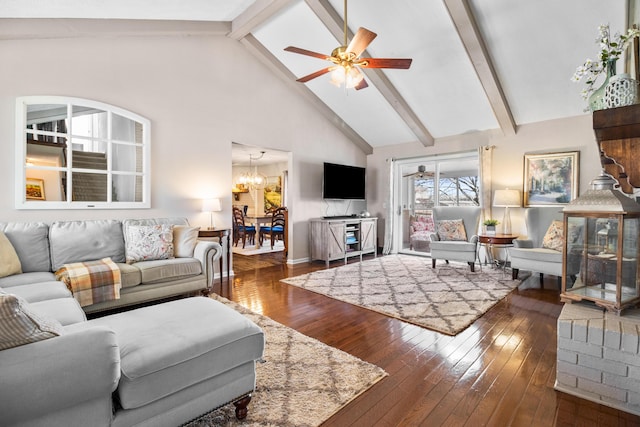 living room featuring high vaulted ceiling, hardwood / wood-style floors, a ceiling fan, a chandelier, and beamed ceiling