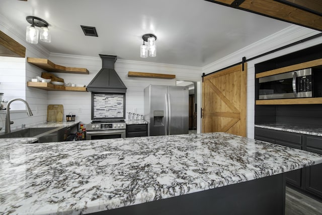 kitchen featuring visible vents, appliances with stainless steel finishes, crown molding, open shelves, and a sink