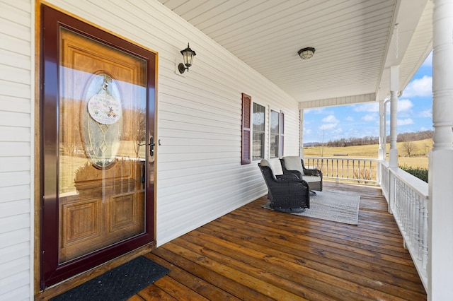 wooden terrace with covered porch