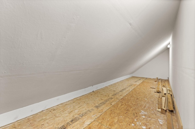 bonus room featuring vaulted ceiling