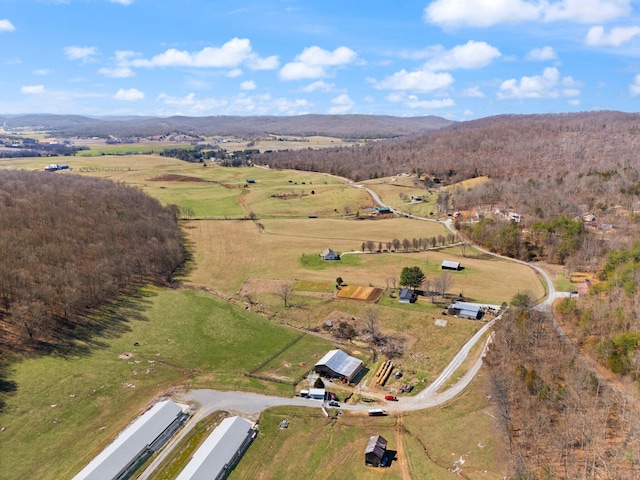 birds eye view of property featuring a rural view