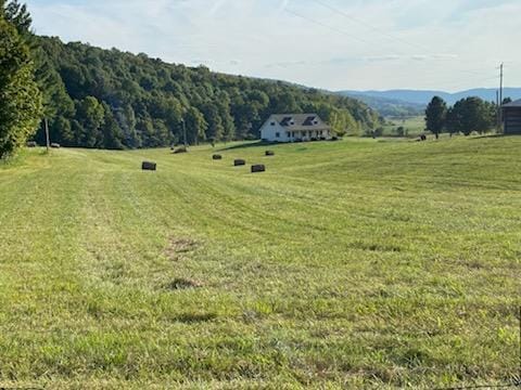 exterior space with a rural view