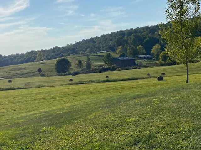 exterior space with a rural view