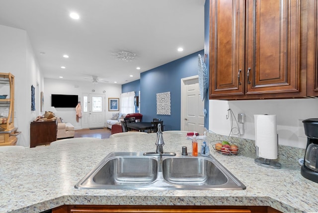 109 Acorn Path, Georgetown, KY 40324 - kitchen featuring light countertops, a ceiling fan, recessed lighting, and brown cabinetry