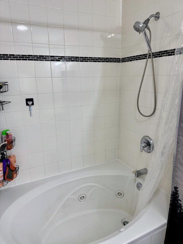 full bathroom with a combined bath / shower with jetted tub